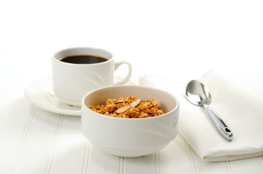 Homemade crunchy granola with almonds and coffee.
