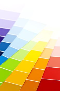 Paint  sample cards of many shades and colors