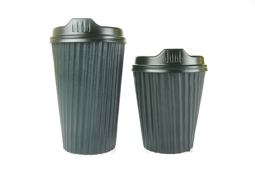 Takeaway coffee cups isolated against an orange background
