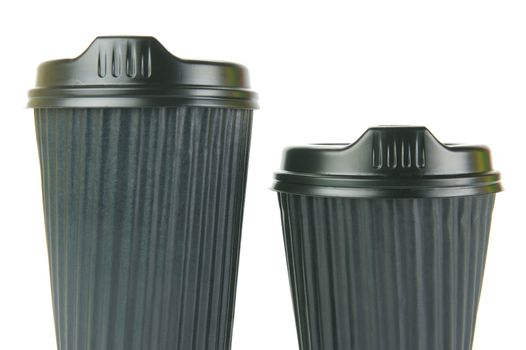 Takeaway coffee cups isolated against an orange background
