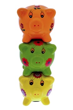 Three piggy banks on top of eachother.