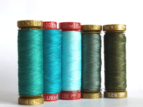 Green sewing threads spools