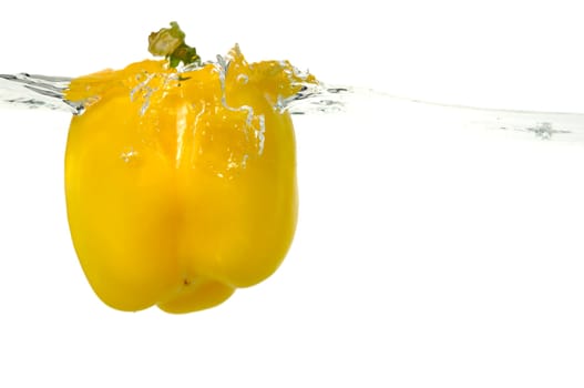 Fruit falling into water. Taken on white background