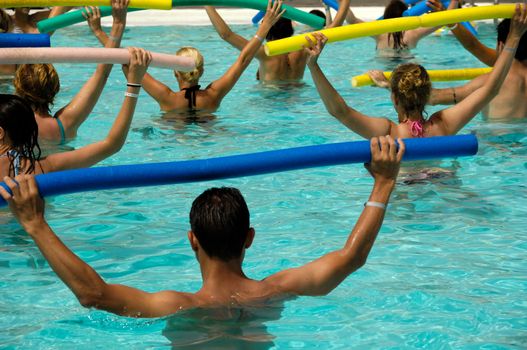 People doing water aerobic in pool