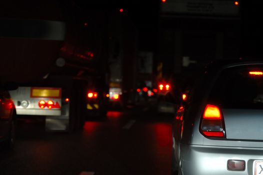 Cars in a line waiting in a traffic jam