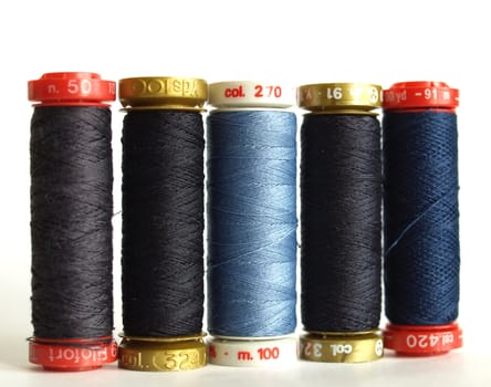 Blue sewing threads spools
