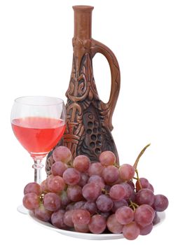 Bright still life with grapes and wine on white