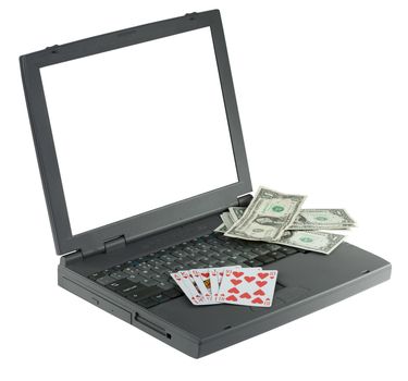 The laptop with playing card and money on white