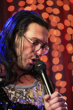 MOSCOW - DEC 25 : Russian singer and musician Oleg Sleptsov from the group "Semi-precious stones" during a show in Moscow in December 25, 2008. 