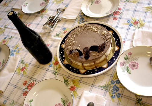 Table with cake and wine