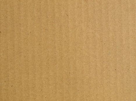 Brown corrugated cardboard sheet background material texture