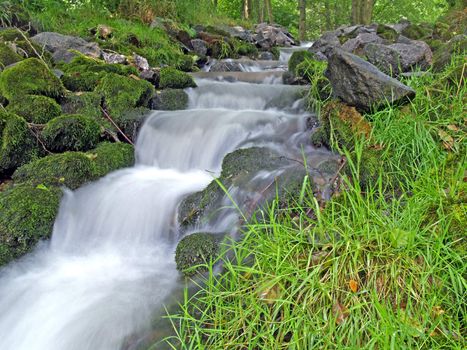 Stream and rocks in a forest in Germany
