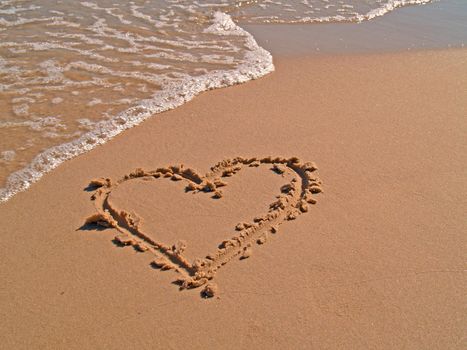 Hearts drawn on sand of a beach, Usedom, Germany
