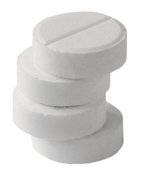 Pile from four gray tablet on the white background