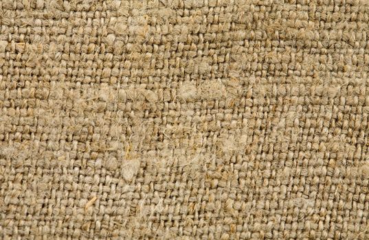 The rural brown sacking background close up