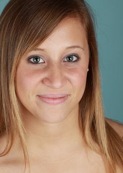 young caucasian woman, blue background