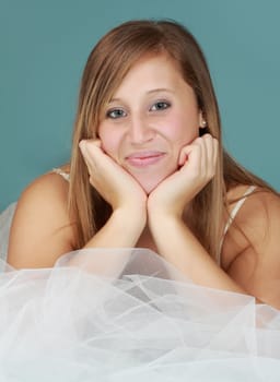 young caucasian woman, blue background