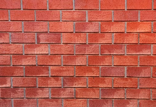 Red brick wall with sunlight.