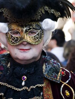 VALLETTA, MALTA - Feb 21st 2009 - People wearing beautiful Venetian style masks and costumes at the International Carnival of Malta 2009