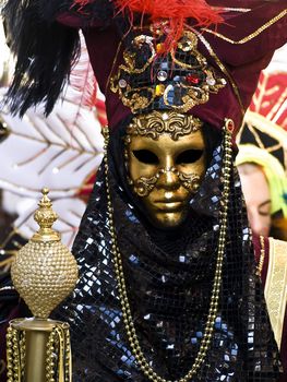 Venetian style masks and costumes at the International Carnival of Malta 2009