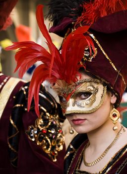 VALLETTA, MALTA - Feb 21st 2009 - Woman wearing beautiful Venetian style mask and costume at the International Carnival of Malta 2009