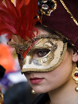 VALLETTA, MALTA - Feb 21st 2009 - Woman wearing beautiful Venetian style mask and costume at the International Carnival of Malta 2009