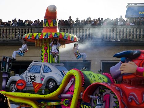 VALLETTA, MALTA - FEB 21 2009 - People watching floats go by at the International Carnival of Malta 2009  