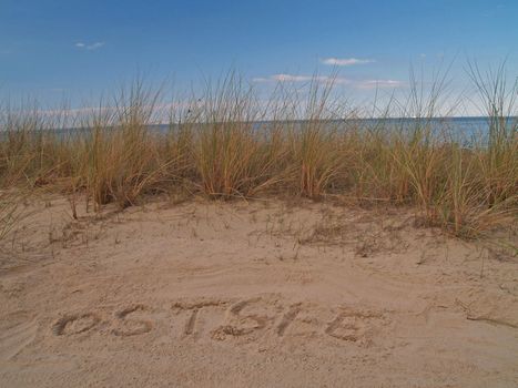 Ostsee, Baltic Sea, drawn on sand on the island Usedom, Germany
