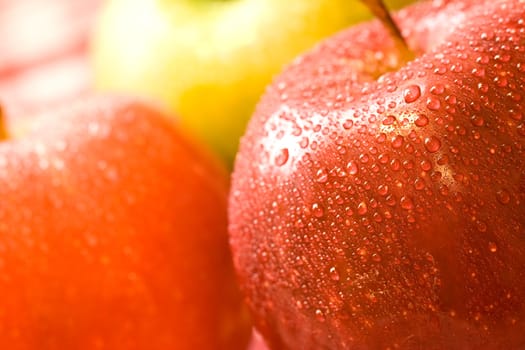 macro shot of fresh ripe apples washed with water