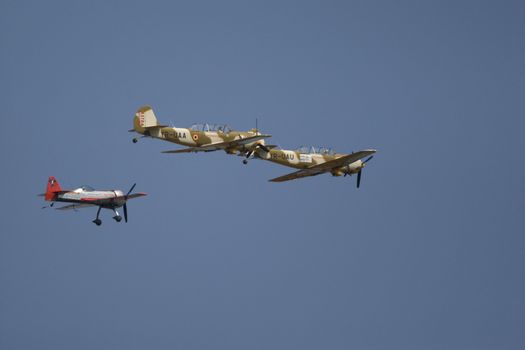 Acrobatic airplanes perform during the airshow on July 17, 2010 on Henri Coanda airport, Bucharest, Romania.