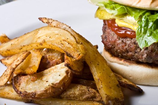 nice big juicy hamburger on a white plate