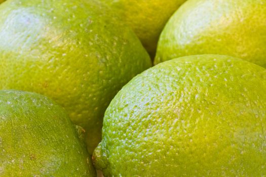 a bunch of limes shot close up