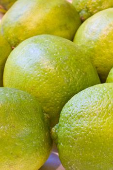 a bunch of limes shot close up