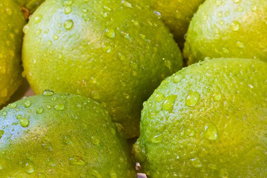 a bunch of limes shot close up