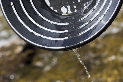 Panning for gold in a northern michigan stream