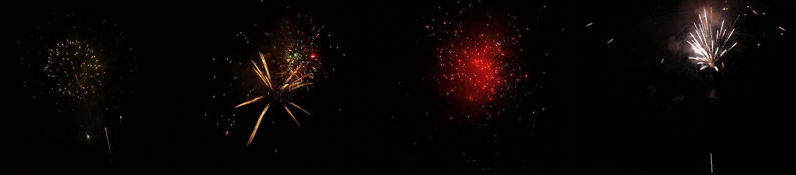 Fireworks display at night with dark black sky background