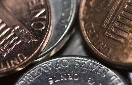 money macro photograph of pocket change focus near the center then blurring towards the edges