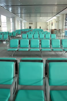 Group of seats in waiting room. Train station hall in Guangzhou, China.