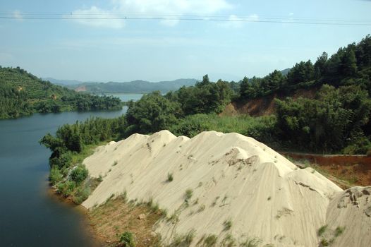 Green, natural landscape with lakes and rivers in Chinese countryside, around town QingYuan in Guangdong province.