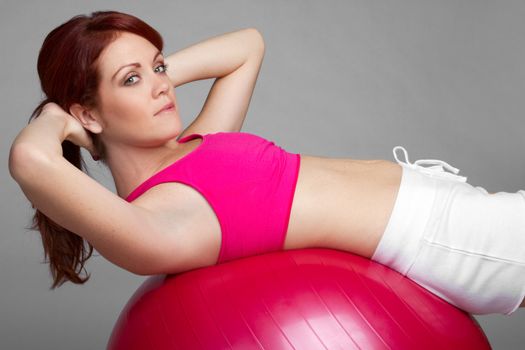 Situps woman using exercise ball