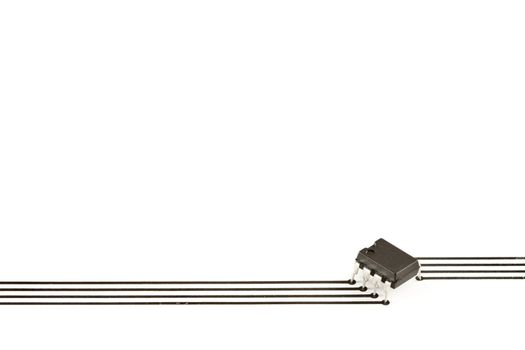 Design elements formed of an electronic chip and tracks printed on paper