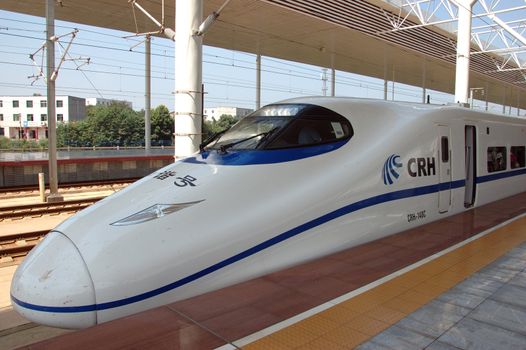 ZHUZHOU - HUNAN, CHINA - OCTOBER 3: China invests in fast and modern railway, trains with speed over 340 km/h. Modern train waits at platform on October 3, 2010 in ZhuZhou station.