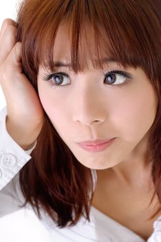 Expression of anxious, closeup portrait of Asian businesswoman face.