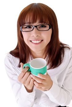 Happy business woman holding cup of coffee with smiling expression against white background.