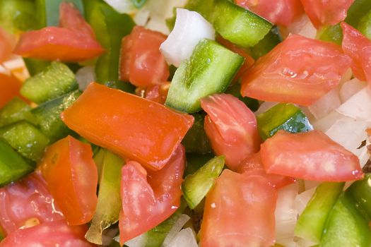 close up shot of mexican bean dip bright reds and greens 