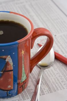 macro of coffee cup on paper