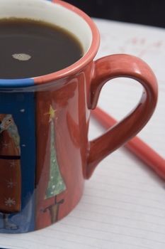 macro of coffee cup on paper