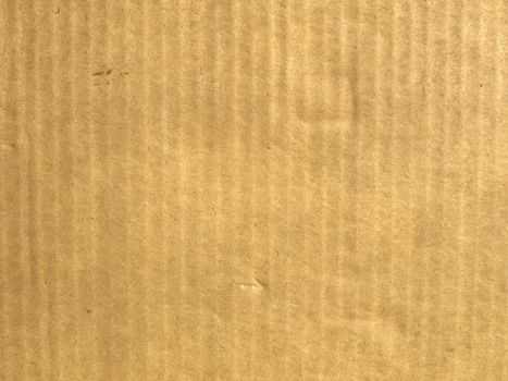 Brown corrugated cardboard sheet background material texture