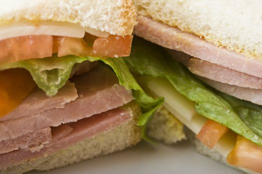 close up of a  ham and cheese sandwich