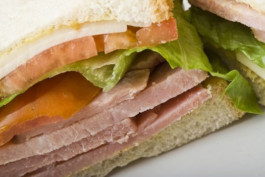 close up of a  ham and cheese sandwich